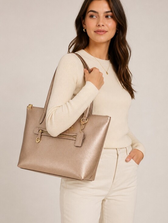 Coach Handbags - Coach Taylor Tote in metallic pebble leather Blush